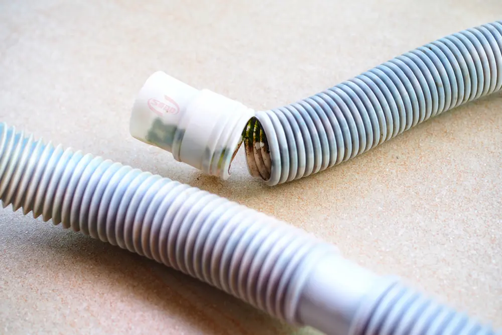 Thay thế đường ống thoát nước máy giặt